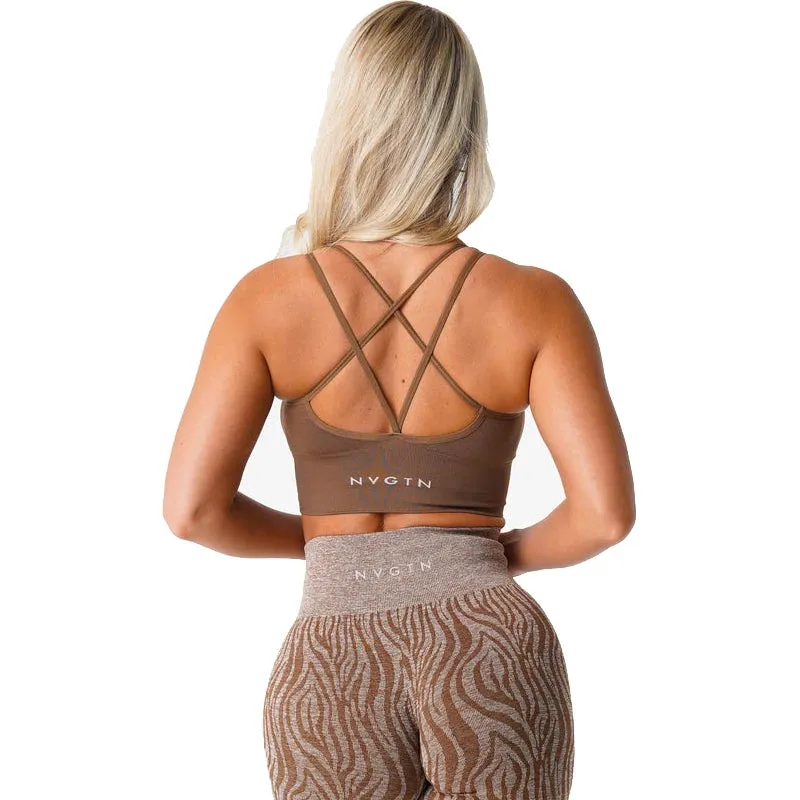 Nvgtn Seamless Flourish Seamless Bra Spandex Top Woman Fitness Elastic Breathable Breast Enhancement Leisure Sports Underwear